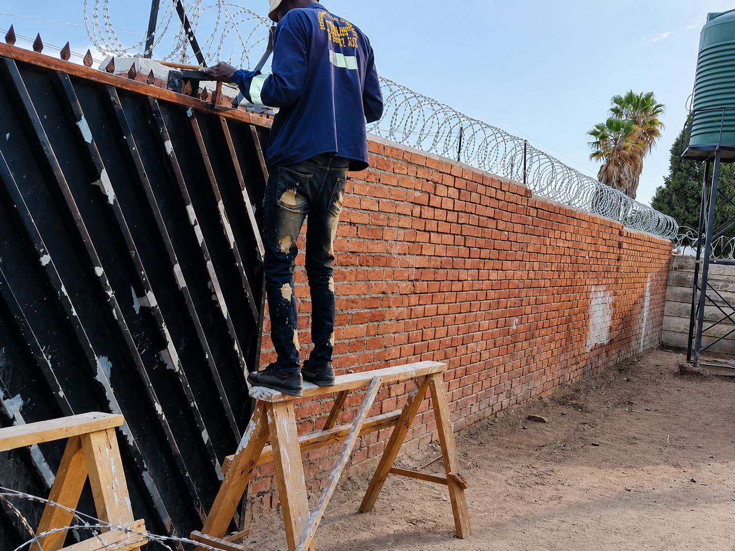 RhinoFence technicians installing security fencing on site